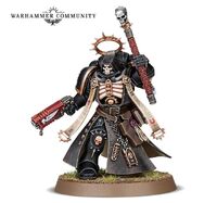 A Primaris Chaplain wielding an Absolvor Bolt Pistol.