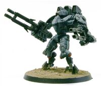 An XV9-04 Hazard Battlesuit armed with Phased Ion Guns, left view