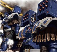 Space Marines of the Ultramarines Legion's Invictus Terminator Squad wearing Cataphractii Pattern Terminator Armour during the Great Crusade