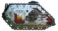 The honoured Land Raider Proteus Onogura, depicted during the 13th Black Crusade in 999.M41; the vehicle's title is derived from Khorchin, the strange language of Chogoris, and translates approximately as "ten heroes" or "ten archers"