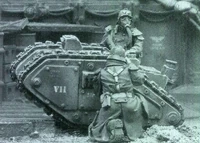 A damaged Cyclops under repair by engineers of the Death Korps of Krieg