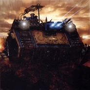 A post-Heresy Thousand Sons Traitor Legion Chaos Land Raider in battle