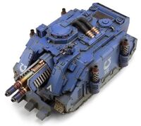 An Ultramarines Legion Vindicator Laser Destroyer (top; left oblique view)