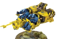 A Land Speeder Proteus armed with a Multi-Melta and piloted by Ultramarines in Mark VI Corvus Power Armour.