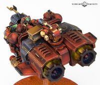 A Pre-Heresy Land Speeder Proteus of the Blood Angels Legion as seen from the rear.