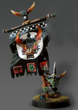 Makari, the banner bearer of Ghazghkull.