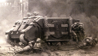 An ancient pict-capture of a Deimos Rhino of the Word Bearers Space Marine Legion during the Horus Heresy