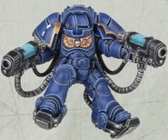 An Inceptor of the Ultramarines Chapter with the expanded rebreather of his Mark X Gravis Power Armour in place to withstand a low orbit combat drop, wielding twin Plasma Exterminators.