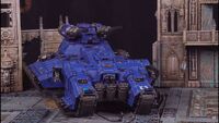 An Astraeus super-heavy tank of the Ultramarines Chapter