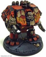 A Ferrum Infernus Dreadnought of the Word Bearers Traitor Legion, armed with a Multi-Melta and a Dreadnought Chainfist.