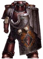 A Word Bearers Legion Breacher; note the Mark III Iron Power Armour covered in meticulously applied Colchisian runes; this Legionary's Boarding Shield bears icon of the Chapter of the Flayed Hand.