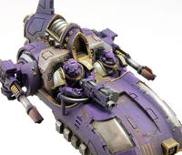 A Javelin Attack Speeder of the Emperor's Children Legion armed with twin-linked Lascannons and a pintle-mounted Heavy Bolter