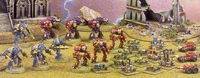 KnightBattle.jpg (3.08 MB) A force of Imperial Knights breaking an Orkish attack; note the size of the Knights compared to their foes.
