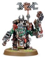 An Ork Big Mek with a Boss Pole.