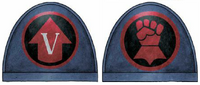 Example Crimson Fists iconography (from left-to-right); a shoulder plate bearing the Tactical Squad designation, and a shoulder plate bearing the Chapter badge