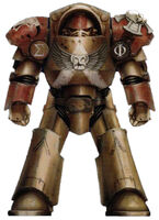 An Astartes of the Minotaurs Chapter in relic Tartaros Pattern Terminator Armour.