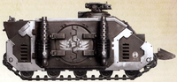 An ancient pict-capture of a Deimos Rhino of the Iron Hands Legion, side-view.