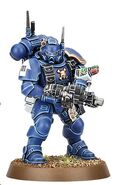 An Ultramarines Helix Adept utilising his Helix Gauntlet.