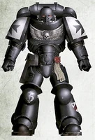 A Black Templars Primaris Space Marine, Battle-Brother Ultricht, 3rd Crusader Squad, Armageddon Crusade; note that to show which Crusade a Black Templar belongs to, a specific campaign badge is often worn upon the left greave.