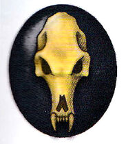 Torfin Daggerfist's pack marking -- a wolf skull which he bears on his armour's shield plate.