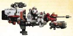   Pre-Heresy Proteus Land Speeder Harrow-03 armed with a  and a . Operated by the Brotherhood of the Black Axe as part of its forward assault squadrons, this Land Speeder was crippled in combat eight times. Note the complex patterns and extensive glyphs applied as decoration.