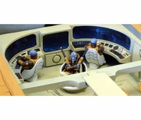 Cut-away view of an Orca command deck with seated Ethereal and two Fire Caste operators