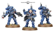 Vanguard Infiltrators of the Ultramarines Chapter armed with Omni-Scramblers, Bolt Carbines and Smoke Grenades.