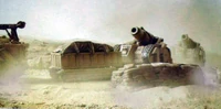 A convoy of Bombards and their Trojan Support Tanks carrying their ammunition during the Taros Campaign