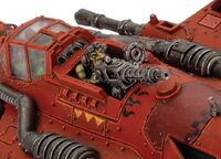 A Gretchin gunner on a Fighta Bomma takes aim with his Dakka gun