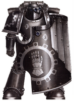 A Pre-Heresy Iron Hands Astartes who served in one of its Legion Breacher Siege Squads; note he is outfitted in Mark III Iron Power Armour and possesses a Boarding Shield