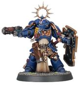 A Primaris Lieutenant of the Ultramarines armed with a Neo-Volkite Pistol, a reinvention of Volkite Weapons technology created by the genius of Archmagos Dominus Belisarius Cawl in the Era Indomitus.