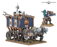 An Empire Master Engineer stands to the right of an Empire War Wagon. (Warhammer: The Old World)