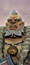 An Ogre Paymaster as depicted in Total War: Warhammer III.[1]