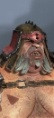 An Ogre Bruiser as depicted in Total War: Warhammer III.