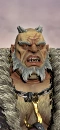 An Ogre Paymaster as depicted in Total War: Warhammer III.[1]