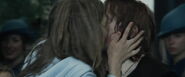 Fleur expresses her gratitude to Ron by forcefully kissing him