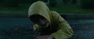 Georgie, trying to escape after Pennywise rips his arm off