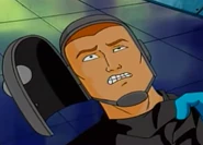 Один из членов банды с открытой маской. Без неё его речь уже была понятной.