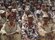 Сомалийские солдаты с характерными красными петлицами со звездой в голубом круге во время парада Победы в Москве, 9 мая 2011 г.