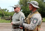 1405464278.jpg (242 КБ) Начальник управления МВД в Хмельницкой области Александр Розизнаный и начштаба самообороны Виктор Данилевский на одном из блок-постов Харьковщины.