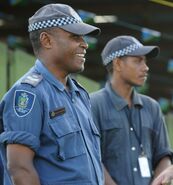 Trooper Trevor Kingston chats to Emmanuel Maepurina from the Royal Solomon Island Police force, prior to the Solomon Islands 32nd Independence Anniversary at Lawson Tama Stadium which Exercise Boss Lift attended.