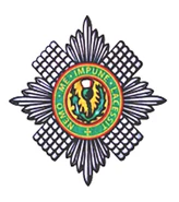 Значок на шапке Шотландских гвардейцев.