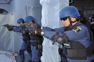 Сотрудники береговой охраны Японии с револьверами New Nambu M60, 2018 год.