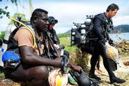 (L-R) Royal Solomon Islands Police Force (RSIPF) Sergeant John Mirikale, Royal Australian Navy (RAN) Leading Seaman Clearance Diver John Spindler and Able Seaman Clearance Diver Rob Panetta prepare to conduct Explosive