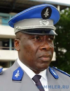 Офицер жандармерии с эмблемой в виде кисти руки с мечом.