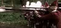 Британський загін дає залп з мушкетів.