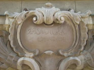 Detal: kartusz z napisem Kasa Chorych w Warszawie