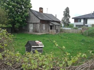 Dom przy Wełnianej 37 (daw. Wełniana 10), ostatnia drewniana chałupa na Moczydle