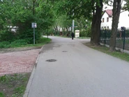 Moczydłowska przed skrzyżowaniem z Wełnianą, widok na północny wschód.