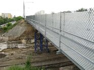 24.06.2009: tymczasowy wiadukt ulicy Powstańców Śląskich nad budowaną Trasą Powązki-Konotopa wzniesiony do czasu budowy nowego wiaduktu